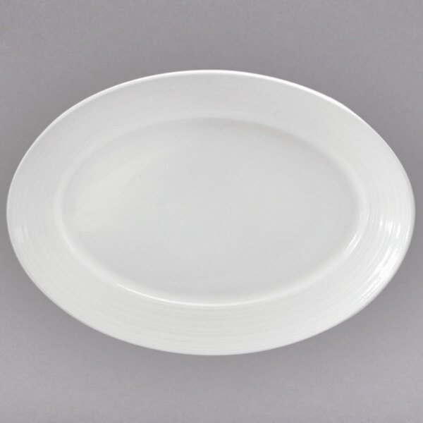 A white oval plate with a white rim.