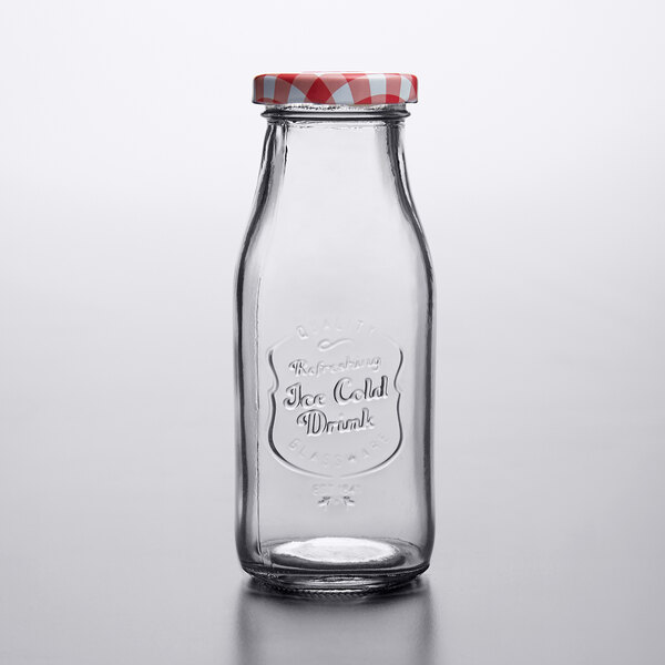 Acopa 10 oz. Embossed Glass Milk Bottle with Lid - 12/Case