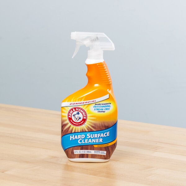 A case of 6 Arm & Hammer 32 oz. hard surface cleaner bottles on a table.