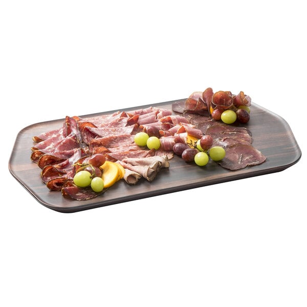 A rectangular Rosseto walnut melamine tray with meat and grapes.