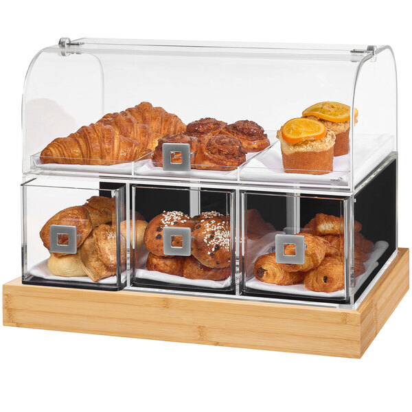 A Rosseto bakery display case with various pastries inside.