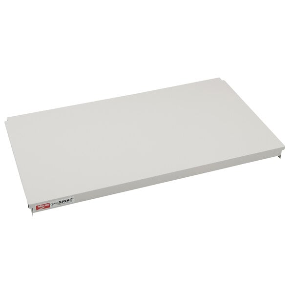A white rectangular Metro qwikSIGHT shelf with a red label.