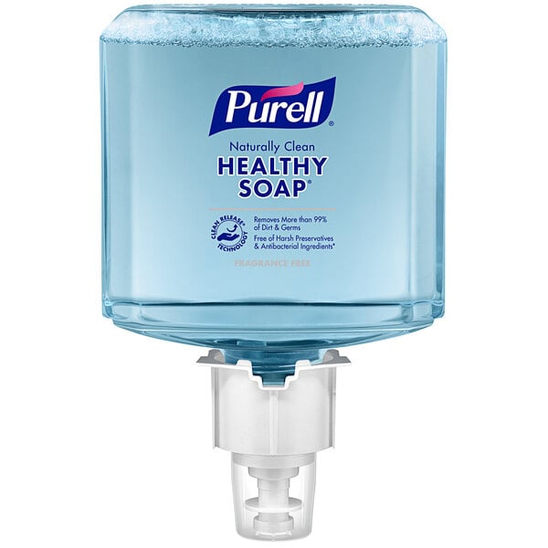 A clear container of Purell Healthy Soap Professional foaming hand soap with white and green labeling.
