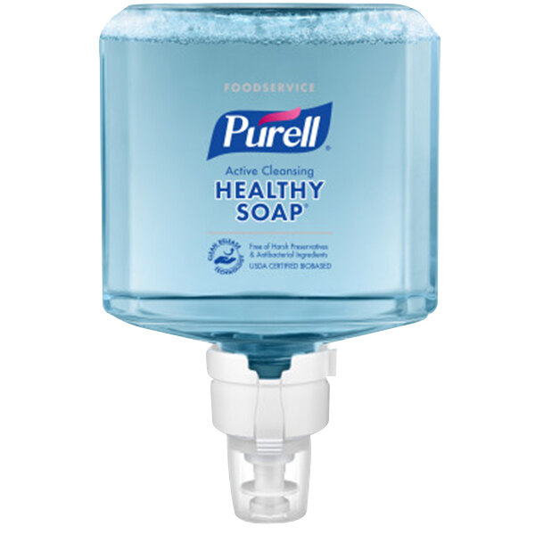 A clear plastic bottle of Purell Healthy Soap with a pump.