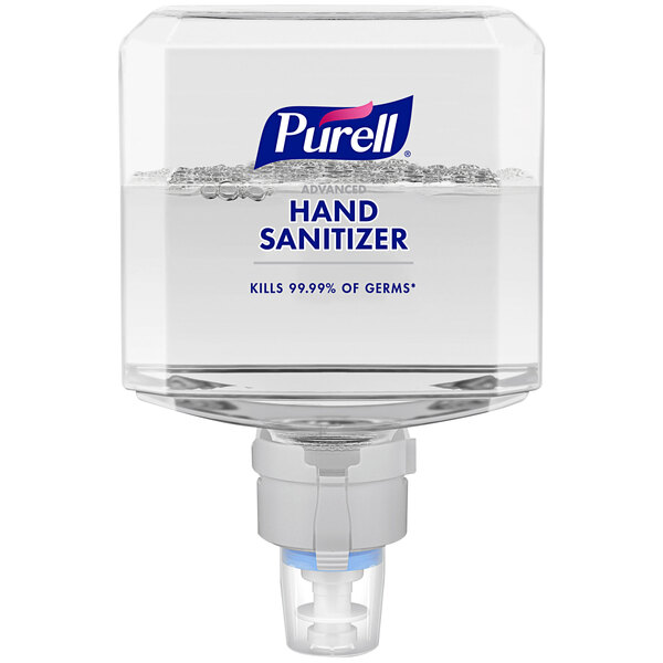 A Purell hand sanitizer dispenser with two bottles of hand sanitizer.