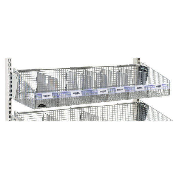 A wire mesh Metro shelf with a clear label holder on it.