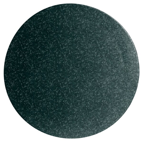 A jade granite round metal disc with a textured finish and white specks on the rim.