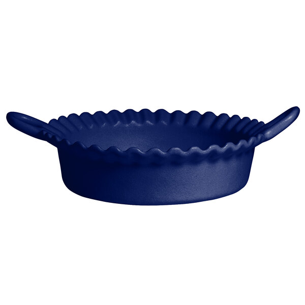 A blue bowl with handles and a wavy edge.