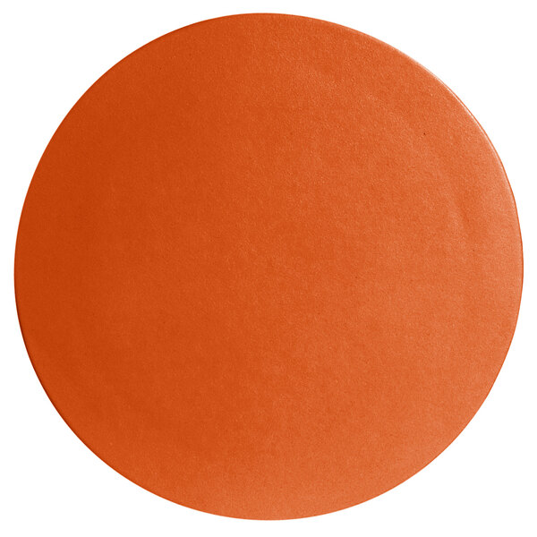 A close-up of a G.E.T. Enterprises tangerine resin-coated aluminum round disc with a textured finish.