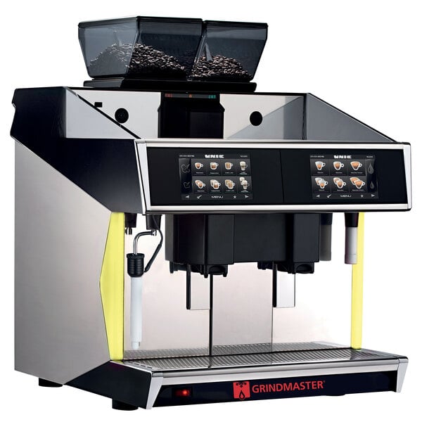 A Grindmaster black bean to cup espresso and cappuccino machine with two coffee pods and a container of coffee beans.