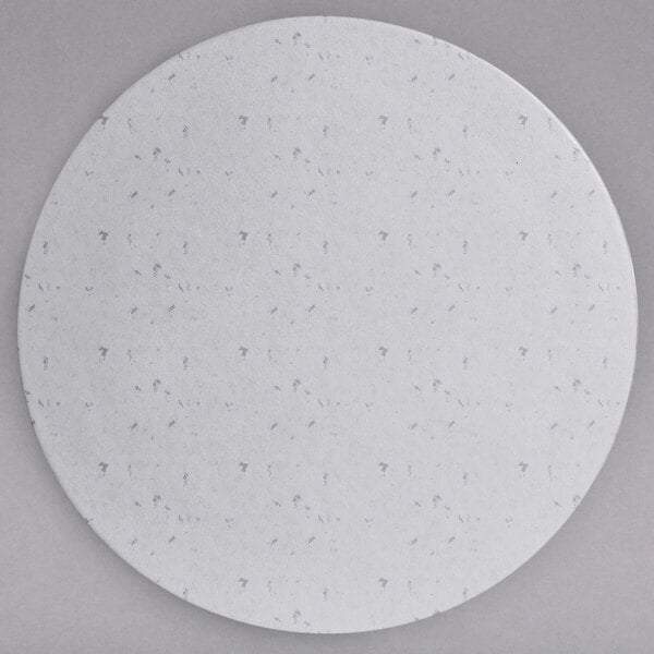 A white round G.E.T. Enterprises Bugambilia large disc with a speckled design.