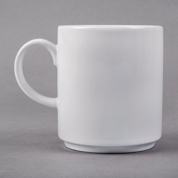 A close-up of the white handle on a Libbey Rigel Constellation mug.