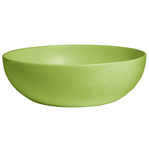 A lime green G.E.T. Enterprises Bugambilia resin-coated aluminum bowl.