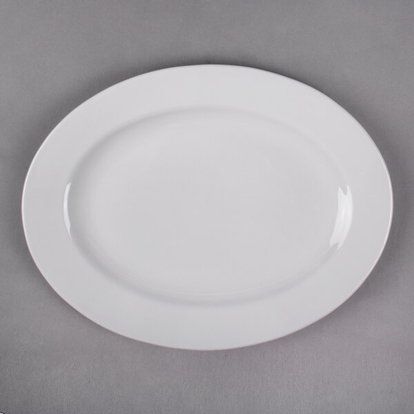 A white Libbey porcelain platter with a white rim.