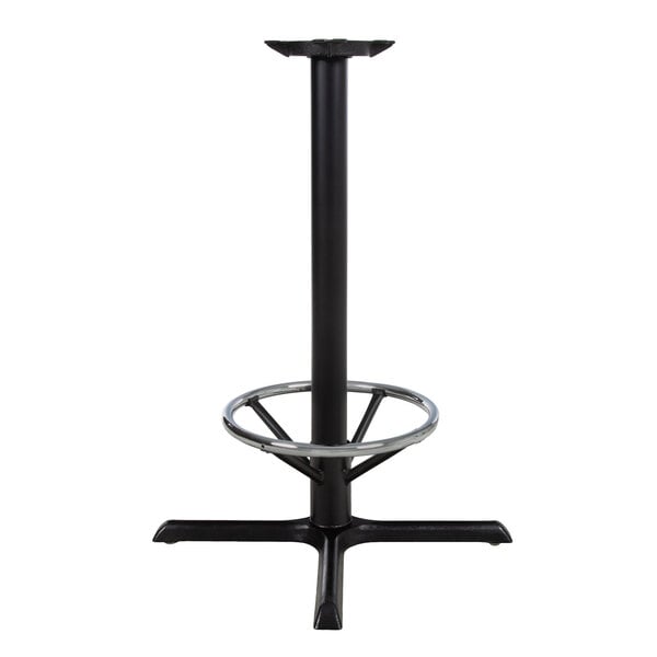 A Lancaster Table & Seating black cast iron bar height table base with a round metal ring.