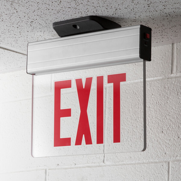 A Lavex LED exit sign with red lettering and adjustable arrows on a wall.