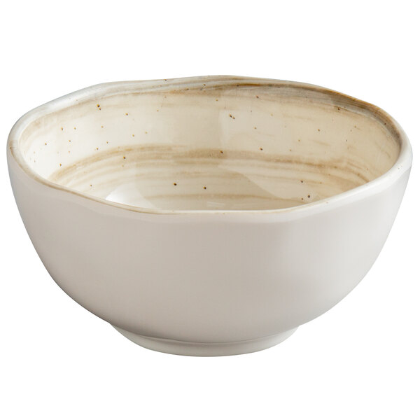 A white Elite Global Solutions tall round melamine bowl with brown specks.