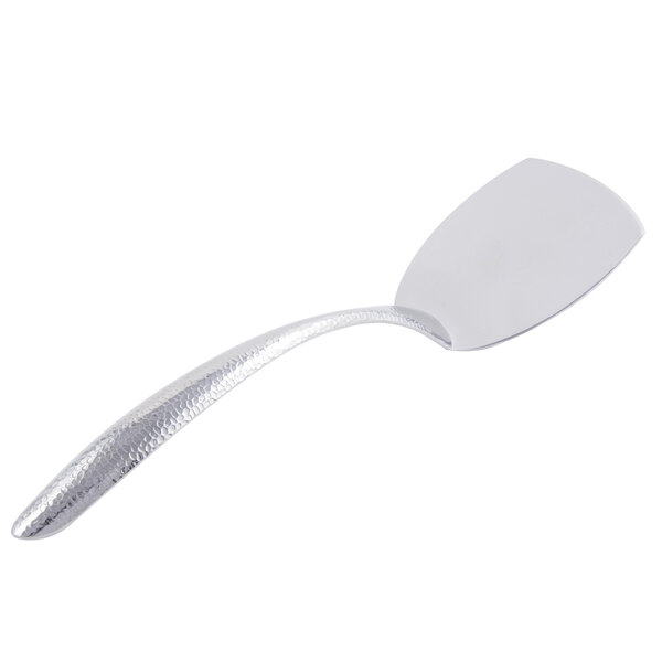 A silver spatula with a hollow handle.