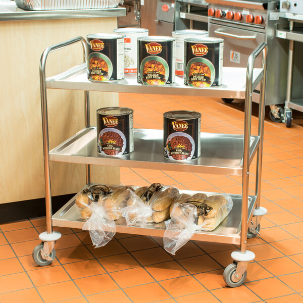 A Choice stainless steel utility cart with food on it.