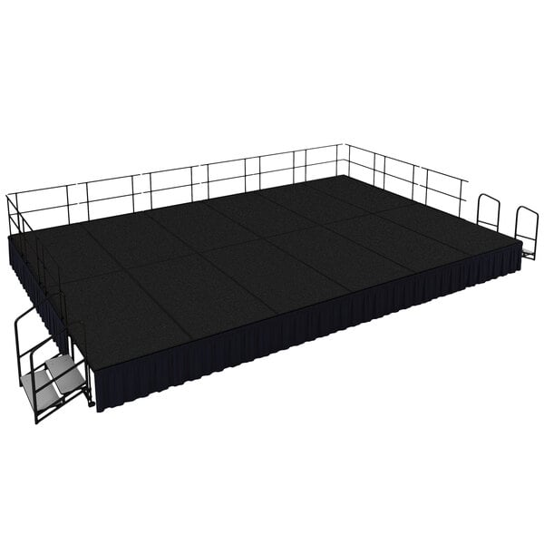 A black stage with black skirting on metal railings.