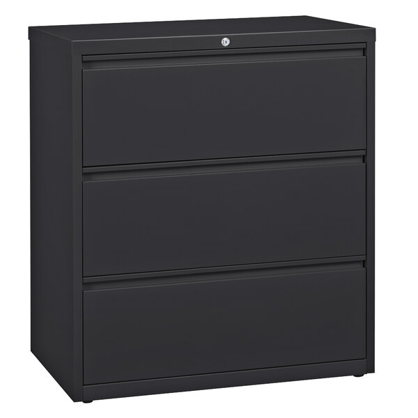 A black Hirsh Industries 3 drawer lateral file cabinet.