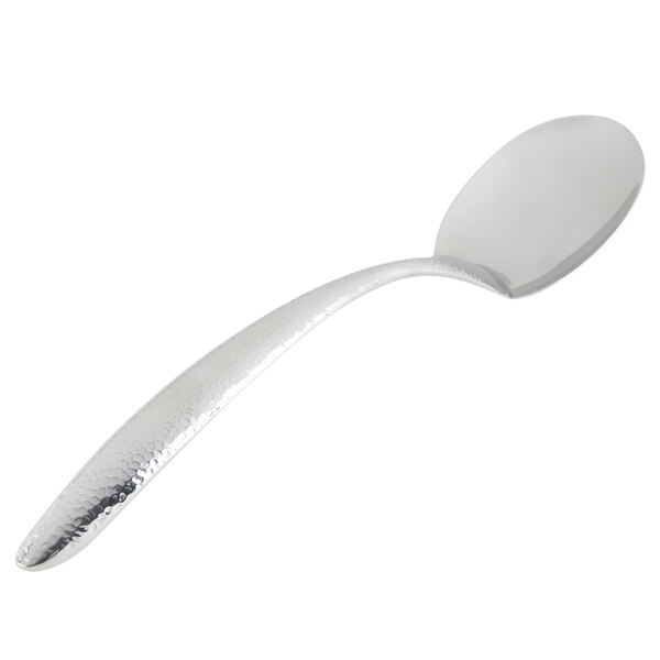 A silver spoon with a textured, curved handle.