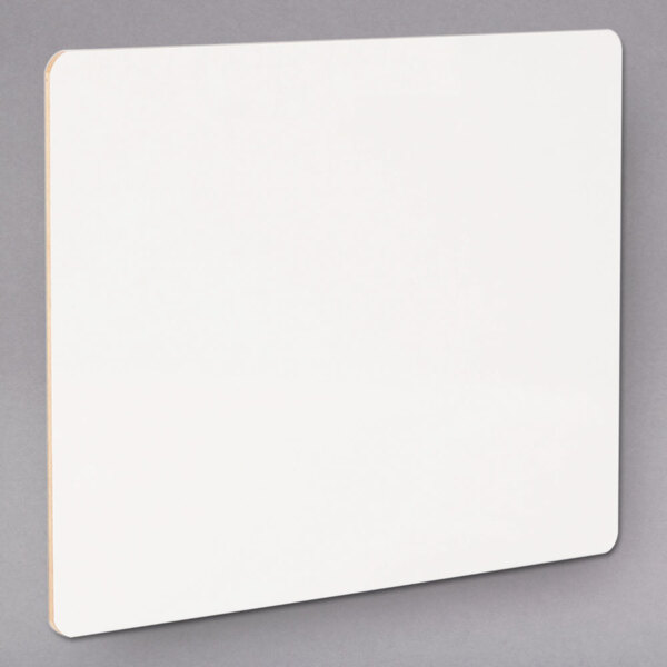 A white rectangular Universal dry erase board with a wooden edge.