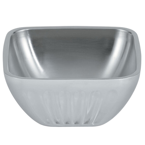 A silver Vollrath double wall serving bowl with a fluted edge.