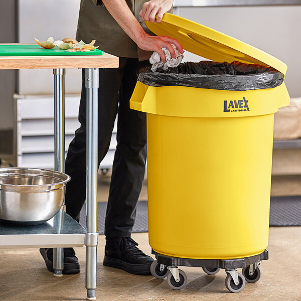 Lavex 64 Gallon Yellow Wheeled Rectangular Trash Can with Lid and Step-On  Attachment