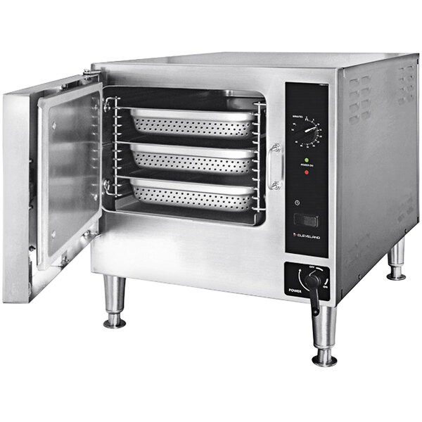 A Cleveland SteamChef electric countertop steamer with trays inside.