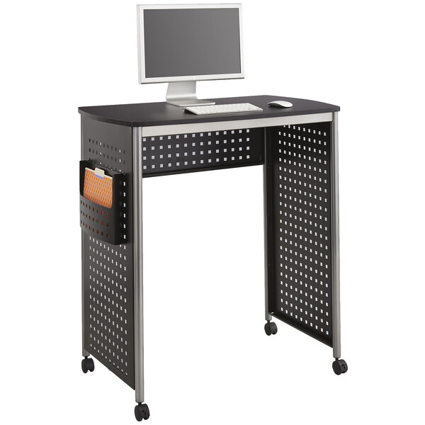 A Safco black and silver stand-up computer desk with wheels and a computer monitor.