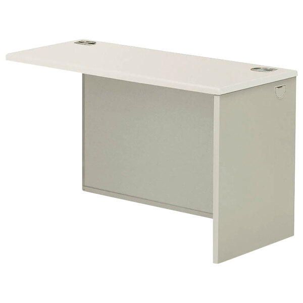 A white desk with a gray surface and base.