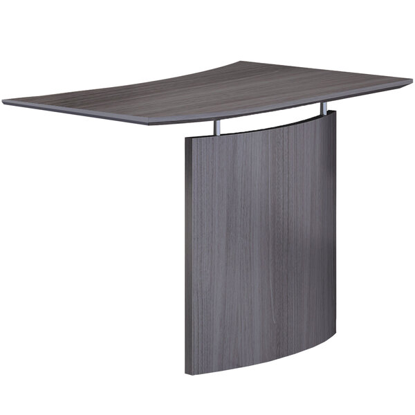 A grey steel laminate desk bridge with a curved top.