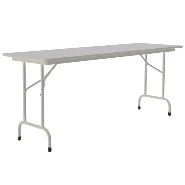 A white rectangular table with a gray frame and metal legs.