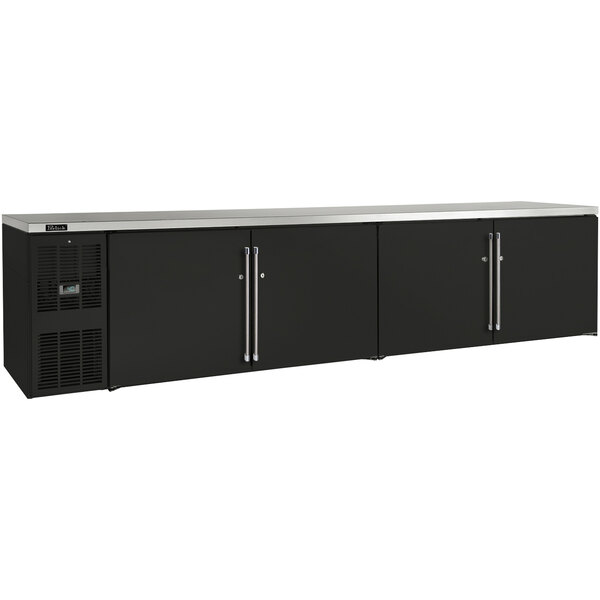 A black Perlick back bar refrigerator with solid doors and drawers.