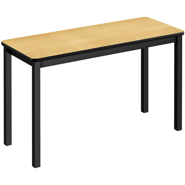 A Correll rectangular lab table with black legs and a wood top.