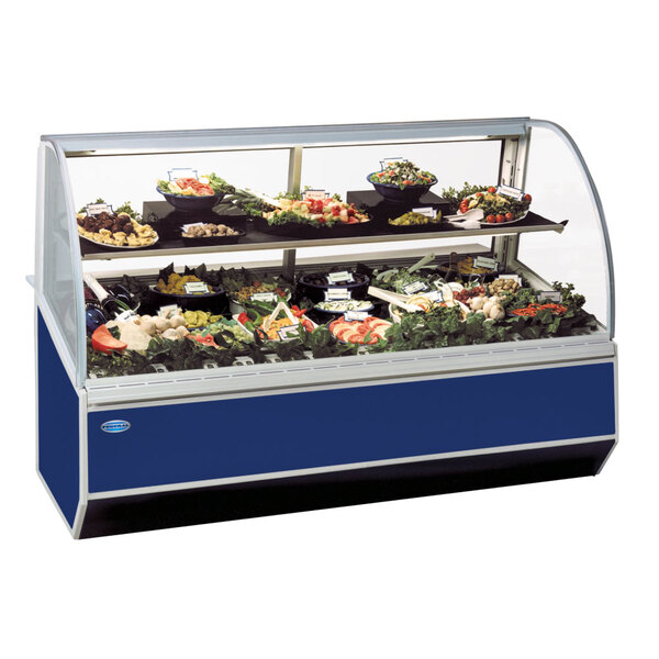A Federal Industries Series '90 refrigerated deli case with food on display.