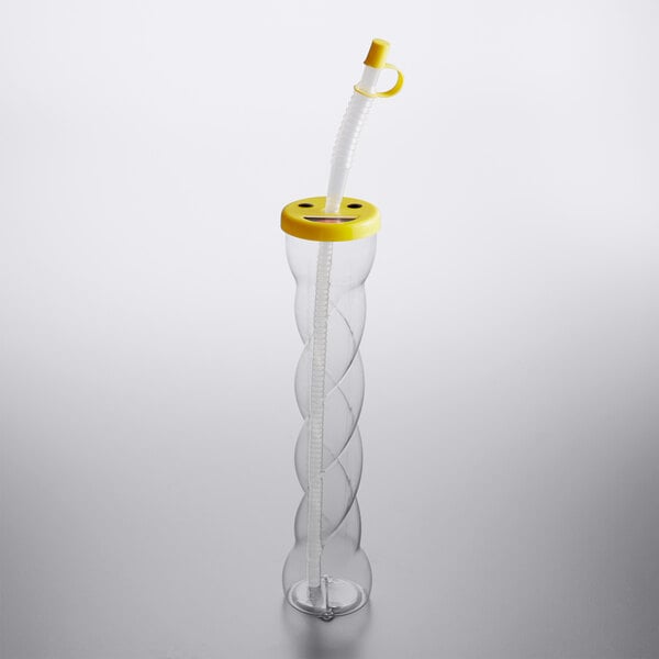 A white plastic Twisted Kiddie Yarder with yellow Emoji topper and straw.