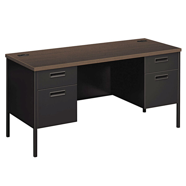 A HON Mocha and Black pedestal desk with drawers on it.