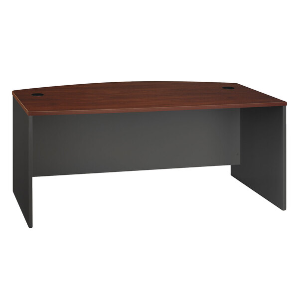 A Bush Hansen Cherry and Graphite Gray Bow Front Desk Shell with a curved top.