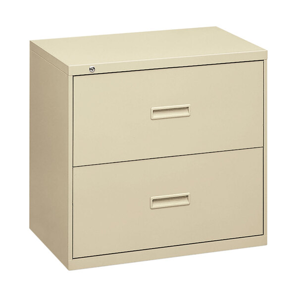 A white HON file cabinet with two drawers.