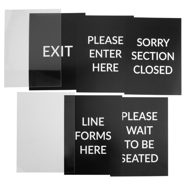 A Lancaster Table & Seating Stanchion sign set with four black and white signs with the words "please exit" in white on a black background.