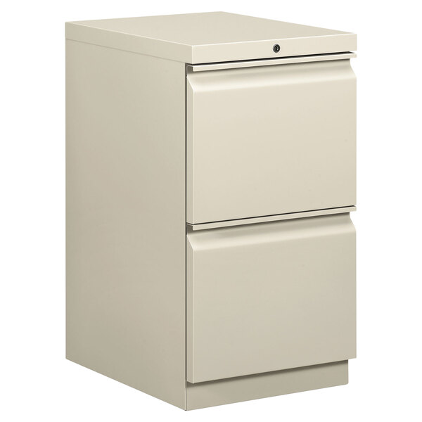 A light gray HON two drawer mobile pedestal file cabinet.