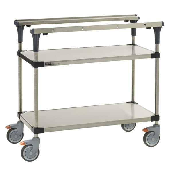 A Metro stainless steel two tier cart with wheels.