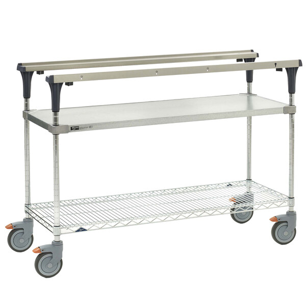A Metro PrepMate MultiStation metal cart with two shelves and wheels.