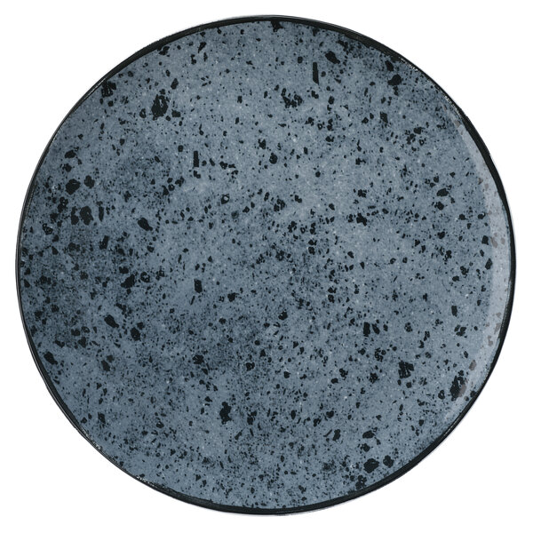 A close-up of a black and gray Schonwald Shabby Chic porcelain coupe plate with speckles.