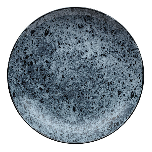 A close up of a Schonwald Shabby Chic stone porcelain deep coupe plate with a black and gray speckled design.