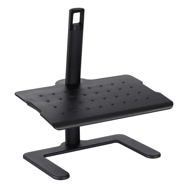 A black Safco footrest with adjustable height on a stand with a handle and holes in the surface.