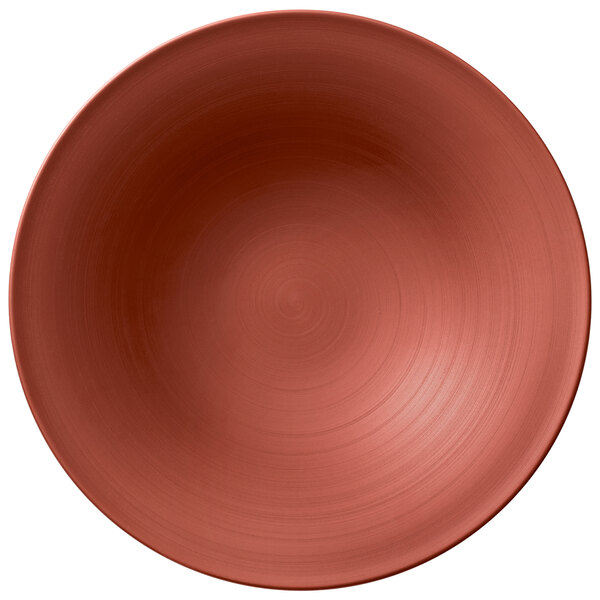 A Villeroy & Boch Copper Glow shallow plate with a red spiral pattern on a white background.