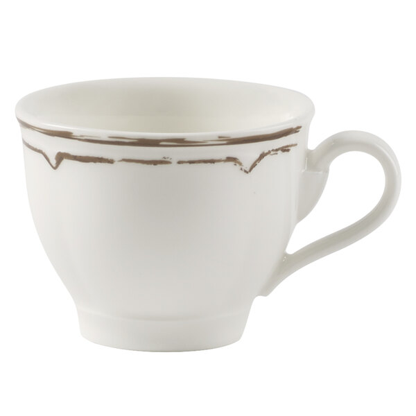 A white Villeroy & Boch espresso cup with brown lines.